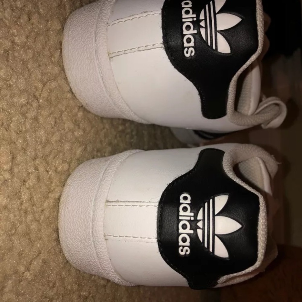 Adidas Superstars.